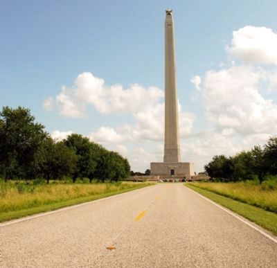 View of monument approaching from access road image. Click for full size.