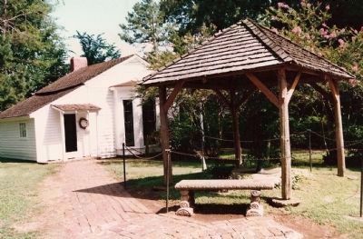 The Well Pump where Helen Keller first learned the word w-a-t-e-r. image. Click for full size.