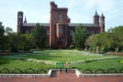 The Enid A. Haupt Garden with the Smithsonian "Castle" behind the parterre image, Touch for more information