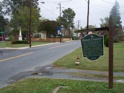 Historic Cemetery Marker seen along Market Street, looking east image, Touch for more information