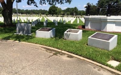 Memorial amongst others in Magnolia Cemetery. image, Touch for more information