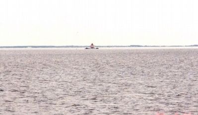 The Chesapeake Bay with the Thomas Point Lighthouse in the background image, Touch for more information