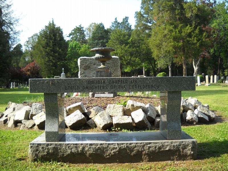 A close-up of the Bench Monument. image, Touch for more information