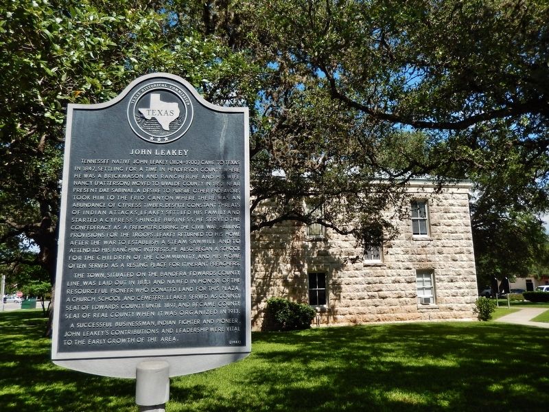 John Leakey Marker (<i>wide view; Real County Courthouse in background</i>) image, Touch for more information