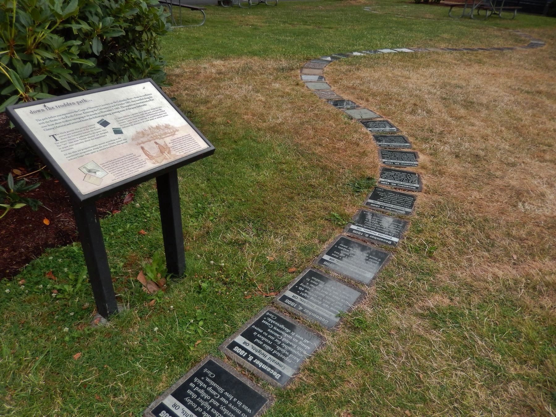 "down the trodden path..." Marker (<i>wide view; showing black granite tiles along the path</i>) image, Touch for more information