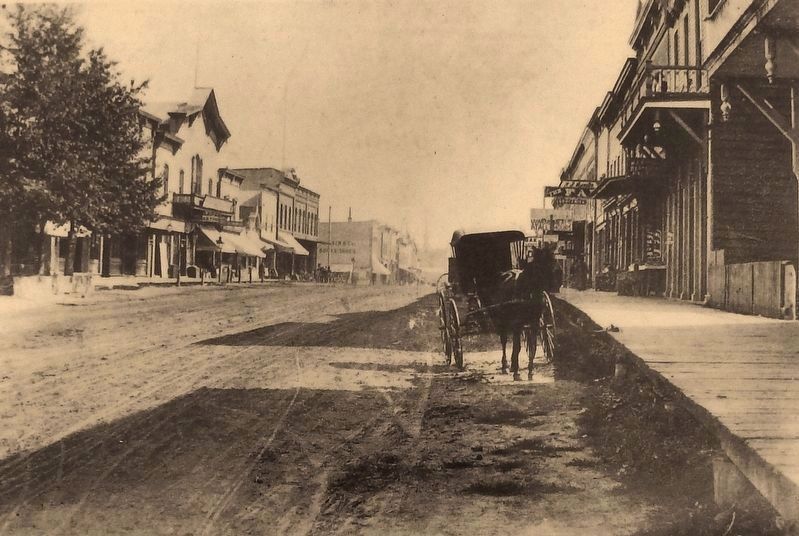 Marker detail: Looking east on Phoenix Street from Kalamazoo Street c. 1898 image, Touch for more information