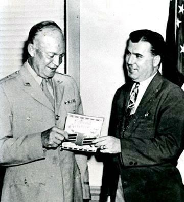 Raymond Weeks Presents Petition to General Dwight D. Eisenhower image. Click for full size.