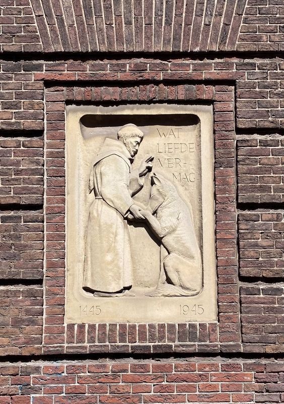 Hartebrugkerk - relief inset in wall west of the entrance image. Click for full size.