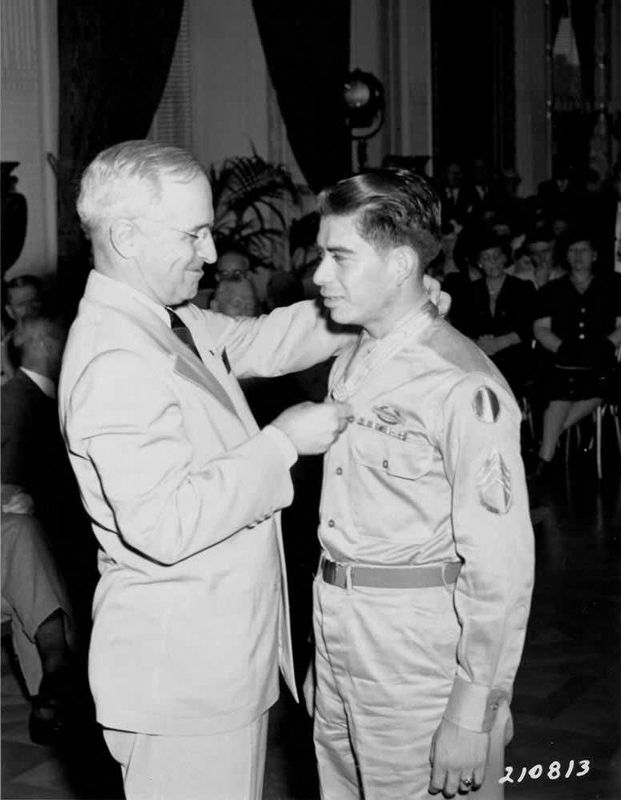President Harry Truman awards the Congressional Medal of Honor to Macario Garcia image. Click for full size.