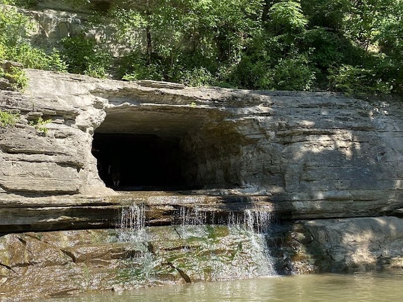 The tunnel carved through the limestone bluff image. Click for full size.